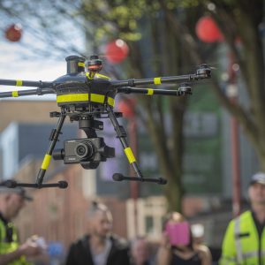 A drone being operated above Hurst Street in Birmingham