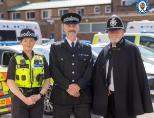 three officers from coventry in their respective uniforms