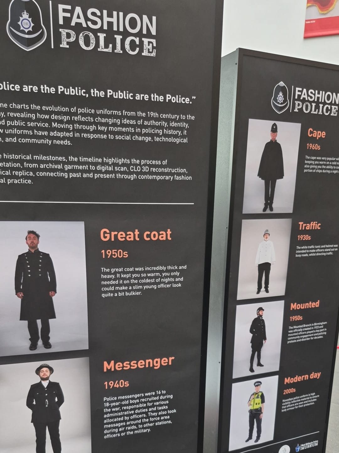 two information boards show photos of models wearing police uniforms in a timeline order with accompanying historical information